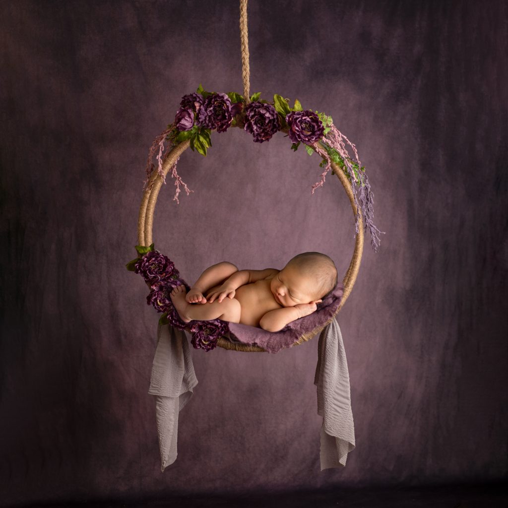 Baby in Purple Swing Artwork